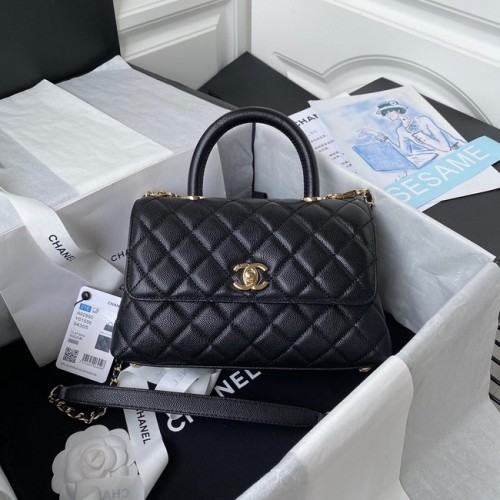 Chanel Klappentasche mit Griff oben Genarbtes Kalbsleder goldfarbenes Metall A92990 schwarz